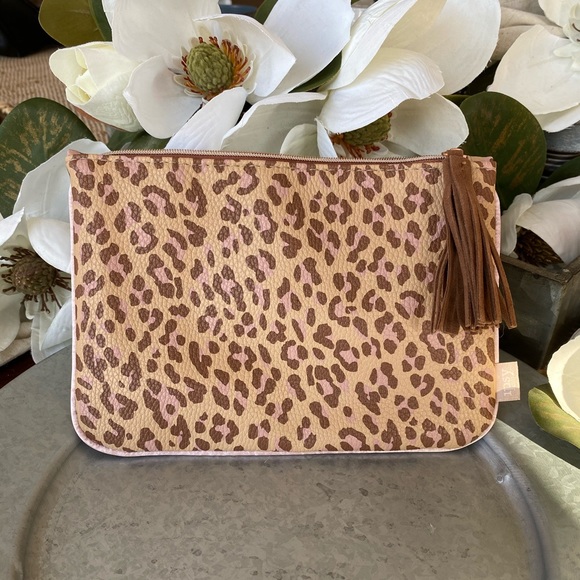 ipsy Handbags - Animal print cosmetics bag